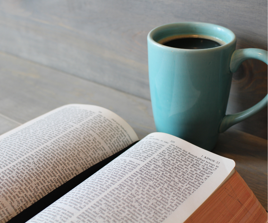 Image of an open Bible and a cup of Coffee